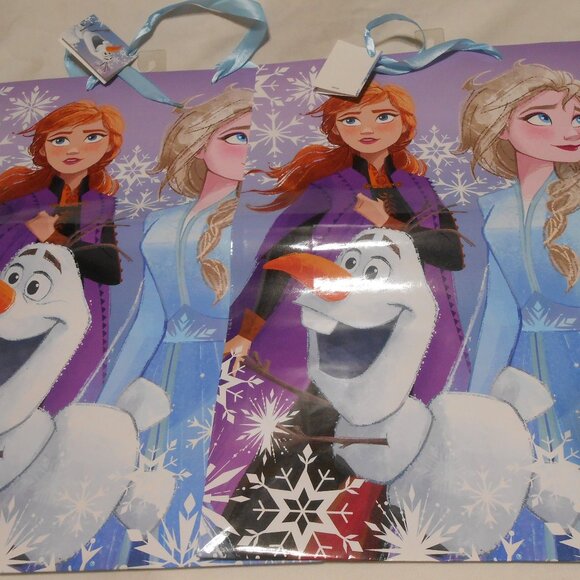 2 NEW LARGE DISNEY FROZEN GIFT BAGS w/ RIBBON HANDLES & NAME TAGS ELSA ANNA ππΈ - Picture 1 of 9